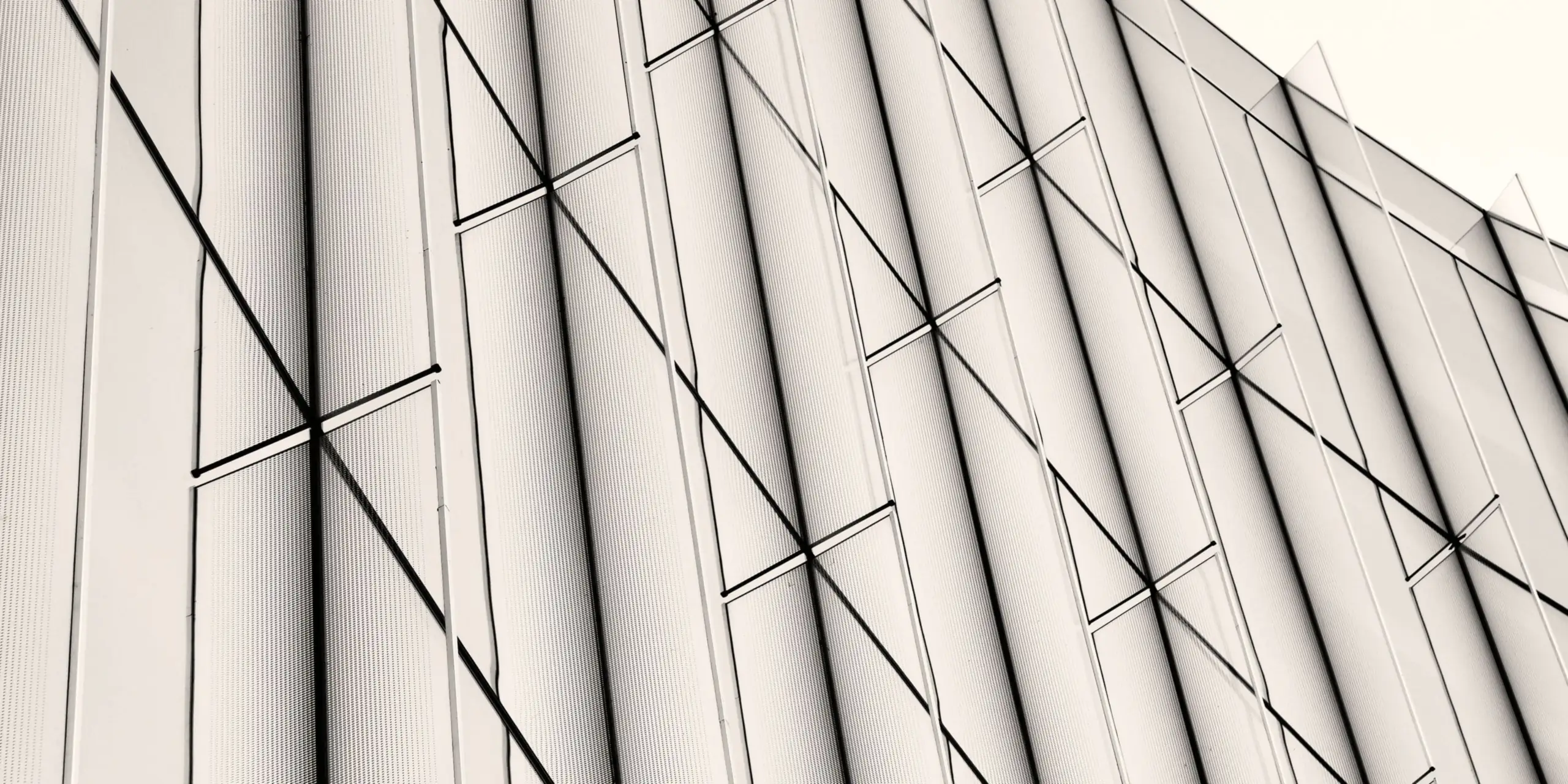 Contemporary glass and metal facade seen from below